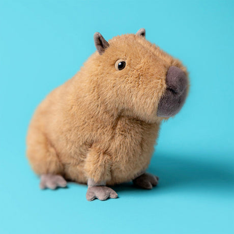 Plush toy capybara on a white background