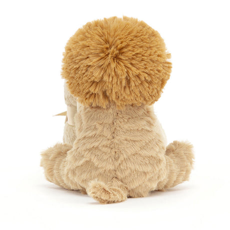 A plush toy depicting a lion with a beige mane and cream-brûlé fur, holding and cuddling a beige soother blanket
