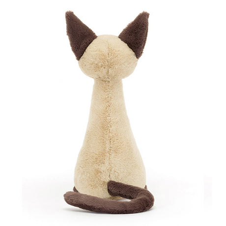 Stuffed animal cat toy with brown ears and tail on a white background