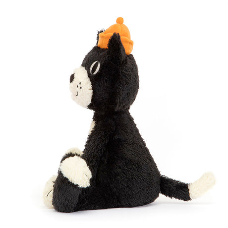 Black plush cat toy with a small orange hat on a white background