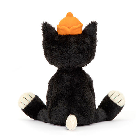 Plush black cat toy with an orange pumpkin hat on a white background