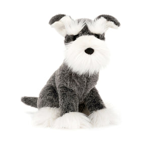 Plush toy dog with gray and white fur on a white background
