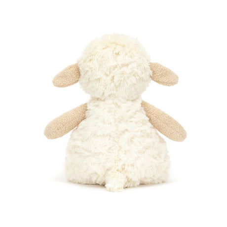 White fluffy toy sheep on a white background
