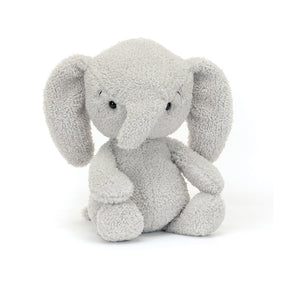 A gray plush toy resembling a baby elephant with short, floppy ears and a soft, chunky head.