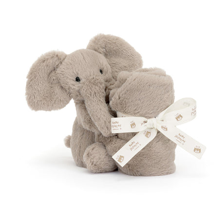 Plush elephant soother toy with a white ribbon on a white background
