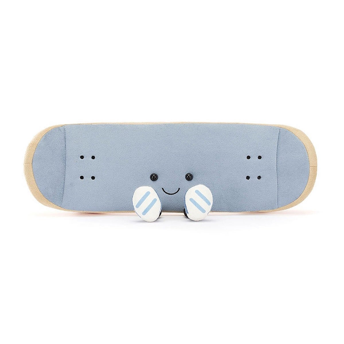 A plush toy in the shape of a skateboard with a smiling face. It has blue fabric with beige edging and orange details.