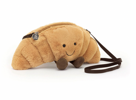 Jellycat bag shaped like a Croissant with a smiling face
