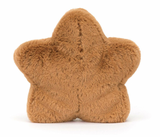 A plush toy resembling a star-shaped cookie with embroidered icing and toffee cord boots, primarily in brown color.