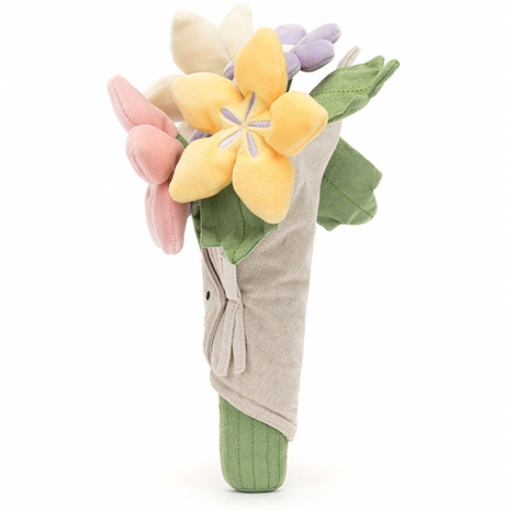 A plush toy bouquet of flowers with varied colors like pink, purple, and yellow, with a smiling face on the front and wrapped in a beige cloth.