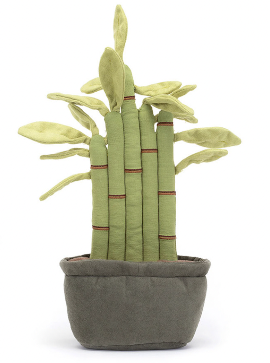 A plush toy resembling a potted bamboo plant with green leaves, red-brown stitch details, and a gray pot. The toy has fluffy soil at the bottom.