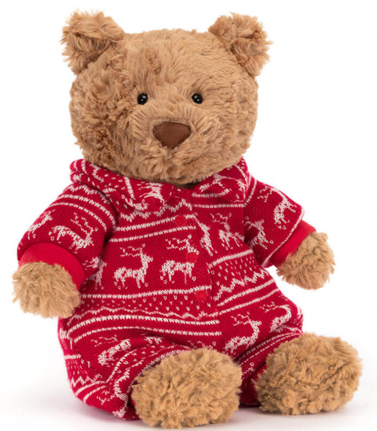 A beige stuffed bear wearing a red and white knitted onesie with reindeer patterns.