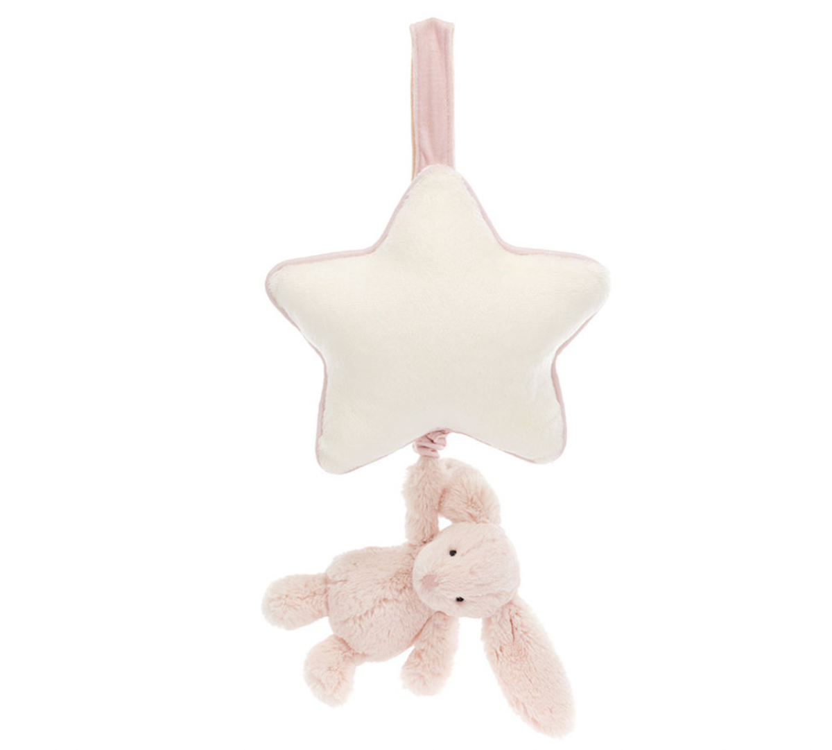 A plush blush pink bunny hanging from a star-shaped musical pull with a cream ribbon.