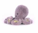 A plush toy resembling a mauve octopus with embroidered features and soft texture.