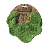 Green baby bib with kale leaf pattern on a brown Oli & Carol branded package