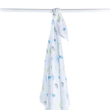 Lulujo 100% cotton swaddle blanket packaging with dinosaur design