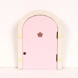 back of pink fairy door with cream frame