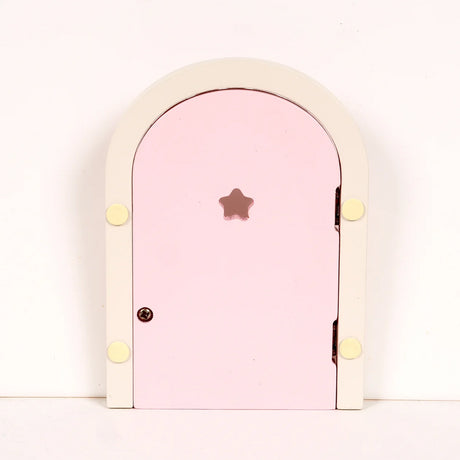 back of pink fairy door with cream frame