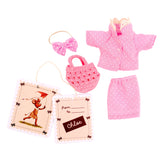 Set of dolls pink polka dot clothing and accessories on a white background