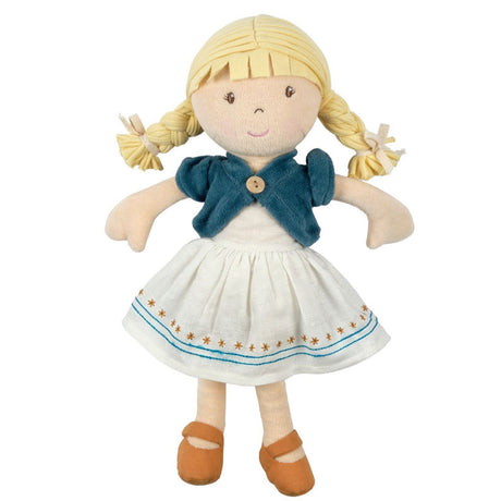 Toy soft doll with blonde pigtails wearing a white dress with blue trim and a blue cardigan on a white background