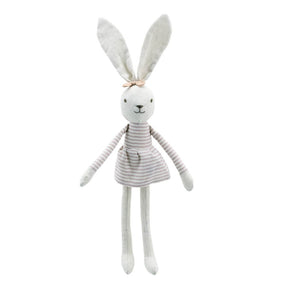 A white linen bunny doll with long ears, a striped dress, and a small bow on its head, photographed against a plain white background.