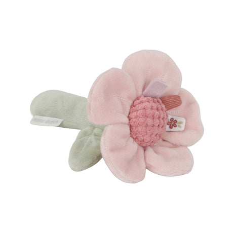 Pink flower-shaped baby rattle toy with a green stem on a white background