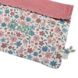 Floral-patterned doll blanket with personalised name