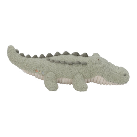 A plush crocodile toy in a textured sage green fabric with a cream underside, shown against a plain white background.