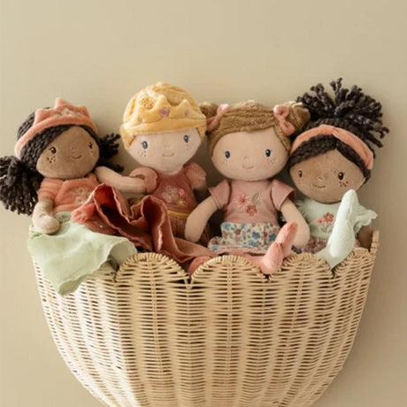 Four Little Dutch soft dolls in a wicker wall basket