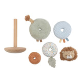 Set of baby toys including a wooden stand, fabric donuts, and a lion toy on a white background