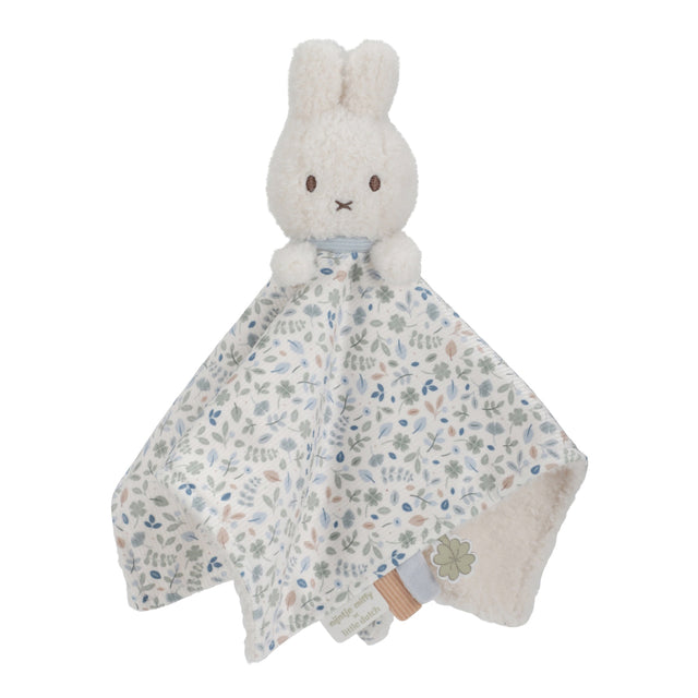 Plush Miffy bunny toy with a floral cloth blanket 