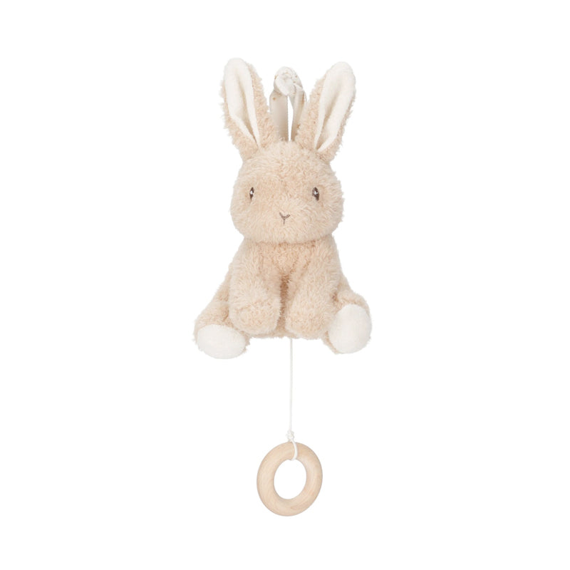 Plush rabbit toy with a wooden ring on a white background