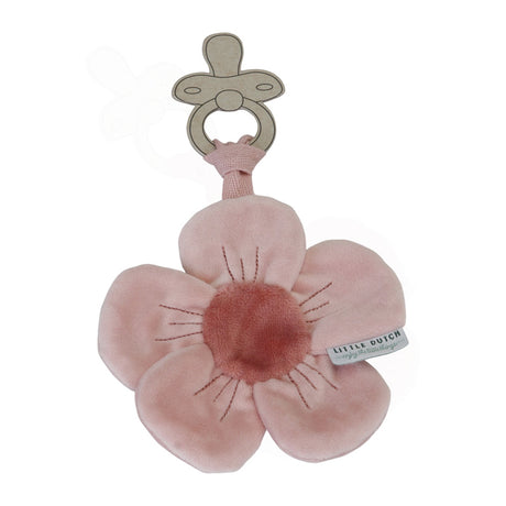 A soft pink dummy cloth shaped like a flower with an attachment,
