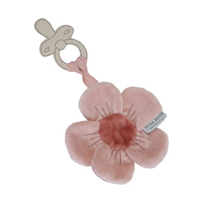 A soft pink pacifier cloth shaped like a flower with a butterfly attachment, suitable for babies.