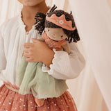 Child cuddling Princess Evi doll by Little Dutch - close up lifestyle shot