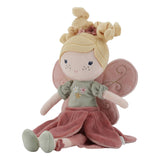 Little Dutch Fairy Mila soft doll seated, showing pink petal skirt, green embroidered top and fairy wings, white background