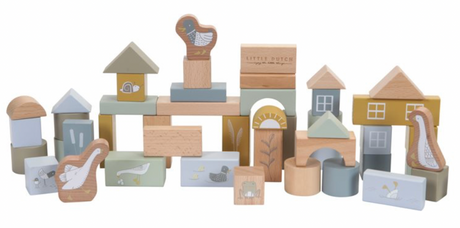 A set of wooden building blocks in various shapes and sizes, decorated with farm and country side animals. The blocks are in shades of blue, beige, and different colours 