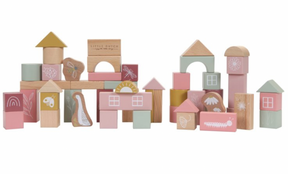 A set of pink wooden building blocks with various shapes and sizes, decorated with illustrations such as animals and houses, stacked together.