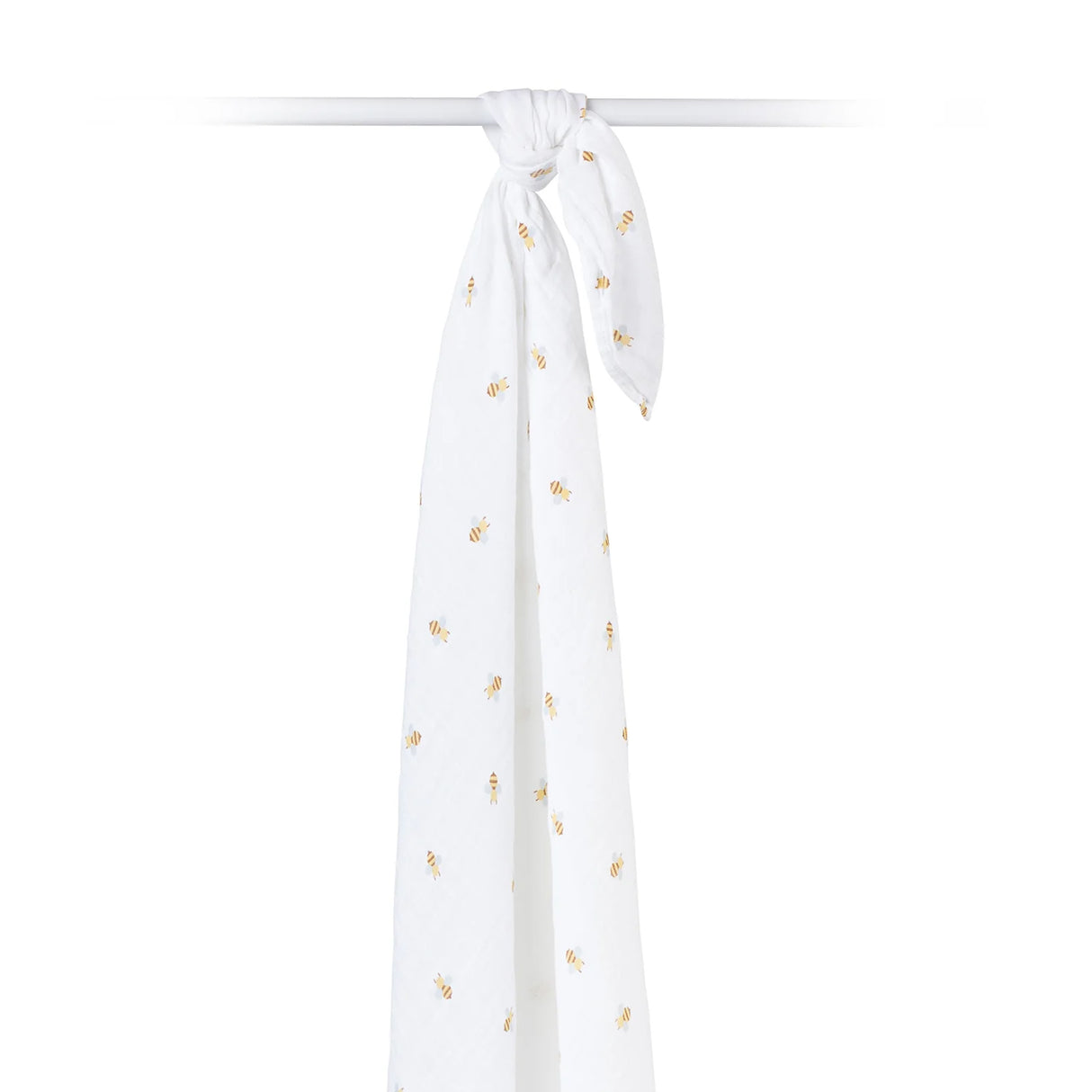 Hanging white muslin swaddle with bee patterns on a white background