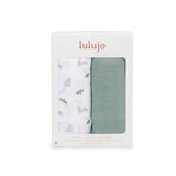 Two baby swaddles in packaging with 'lulujo' branding on a white background