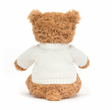 A beige Jellycat Bartholomew Bear with a personalised jumper