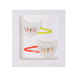Cat-shaped hair clips in a box with 'sweet thing' text on a white background