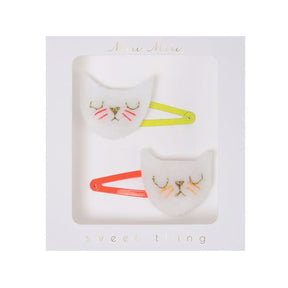 Cat-shaped hair clips in a box with 'sweet thing' text on a white background