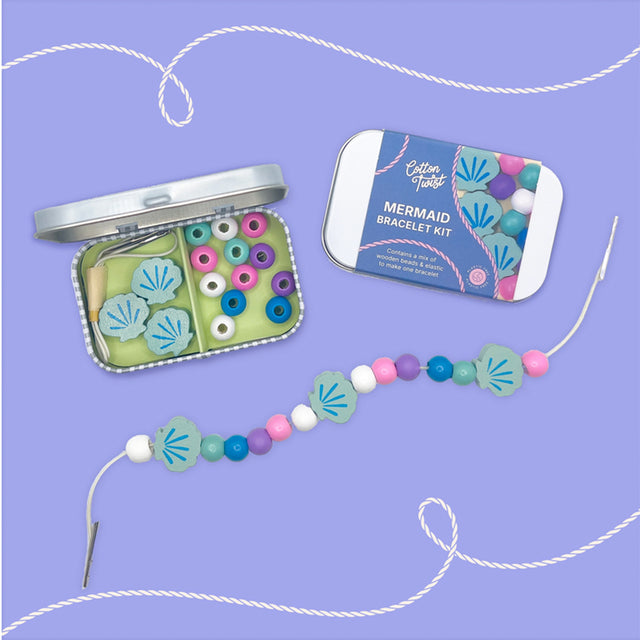 Cotton Twist Mermaid bracelet kids craft  kit with beads and packaging on a purple background