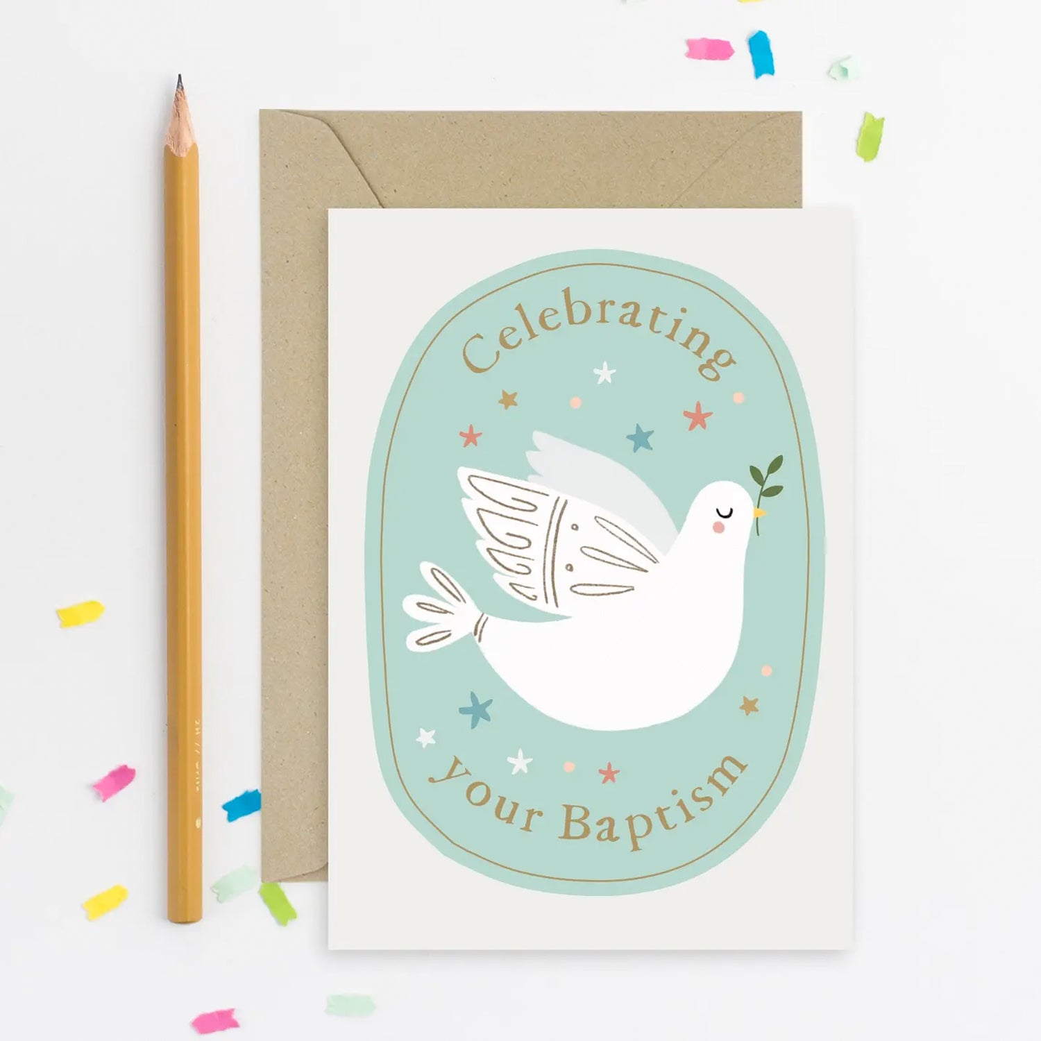 Greeting card with a dove illustration and text 'Celebrating Your Baptism' on a white background with a pencil and confetti.