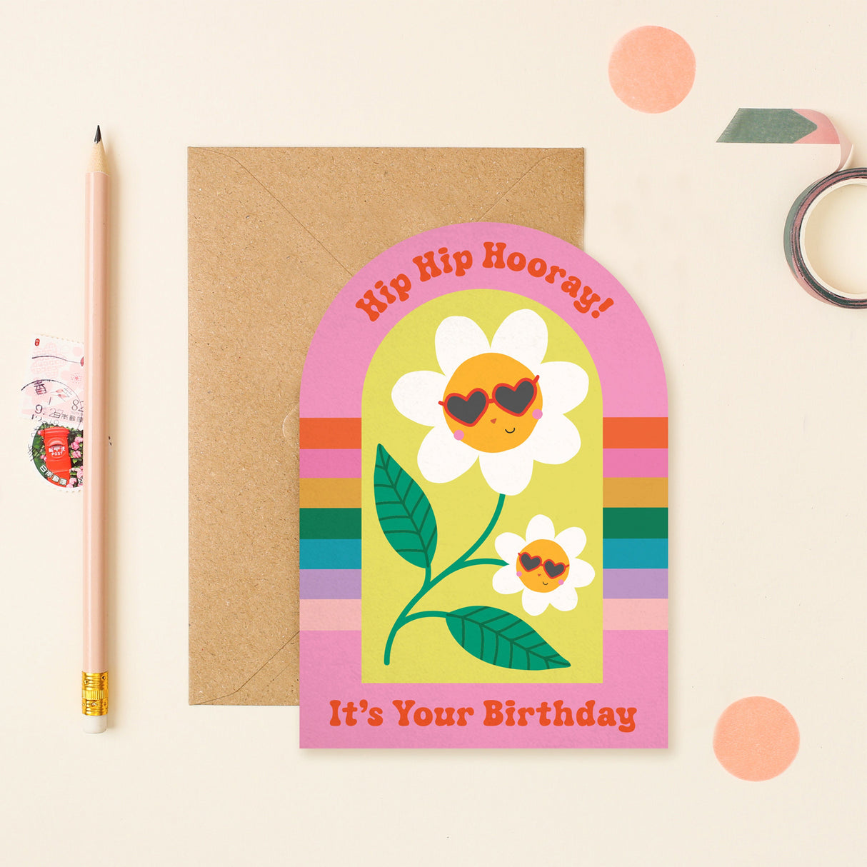 Birthday card with flowers and 'Hip Hip Hooray! It's Your Birthday' text on a beige background.