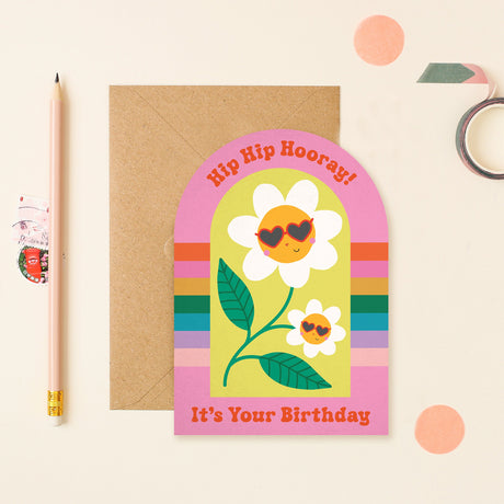 Birthday card with flowers and 'Hip Hip Hooray! It's Your Birthday' text on a beige background.