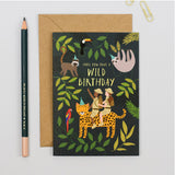 Greeting card with jungle-themed illustration and envelope on a light gray background