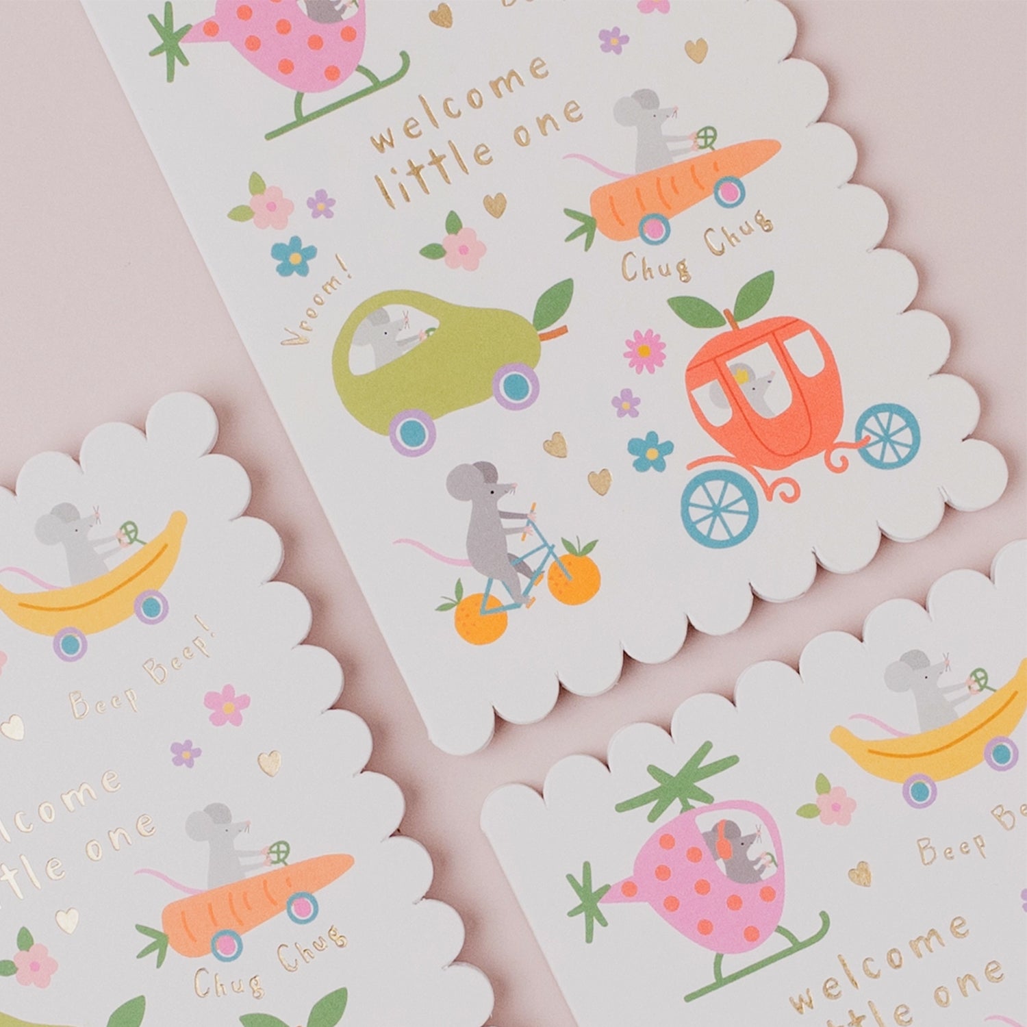 Set of baby-themed cards with illustrations and text on a pink background