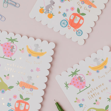 Welcomne to the world new baby cards with mice-themed illustrations on a pink background