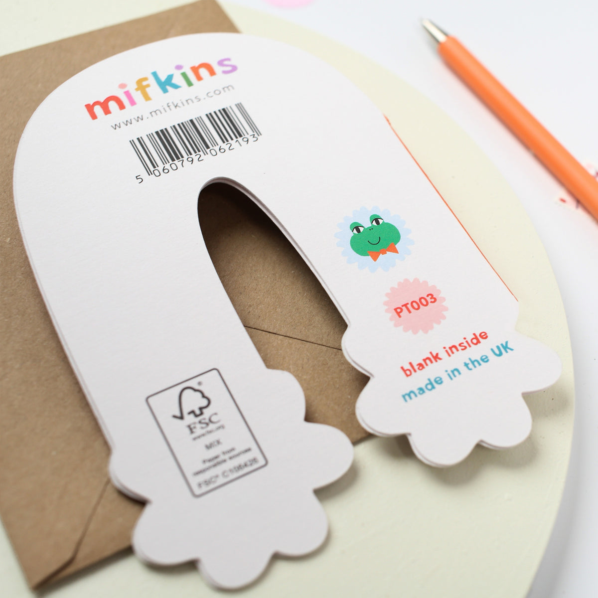 Back of Mifkins Rainbow Blossom Birthday Card with kraft envelope